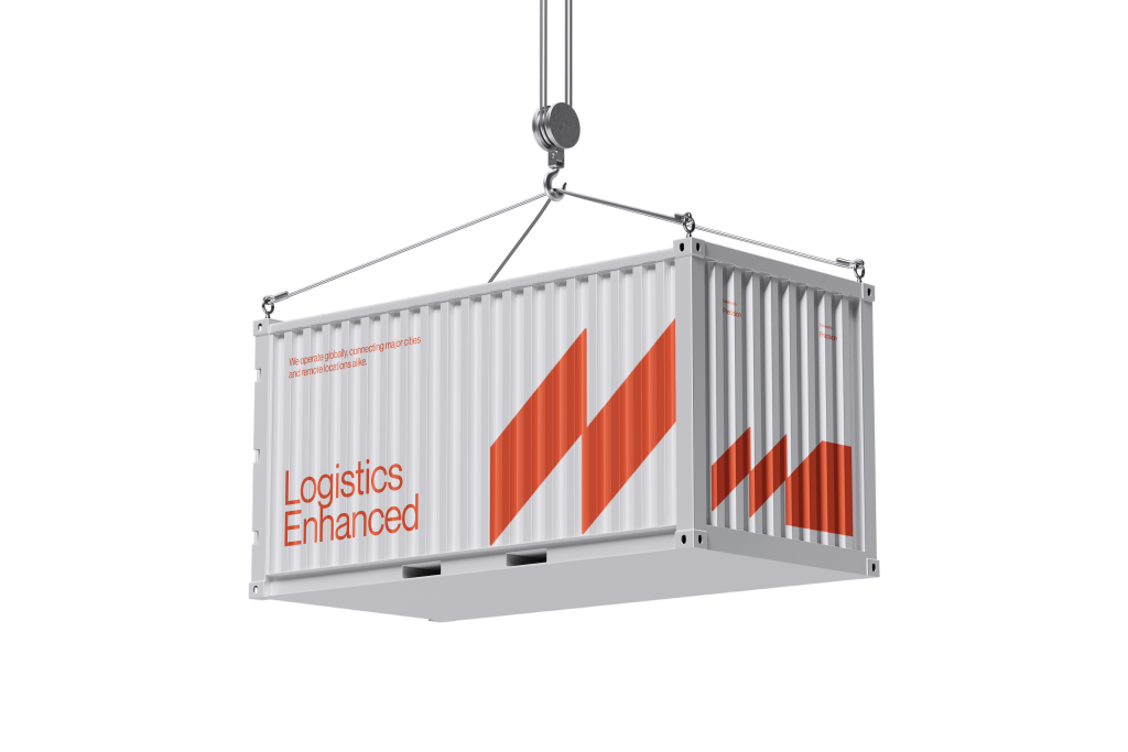 White freight container suspended from a crane